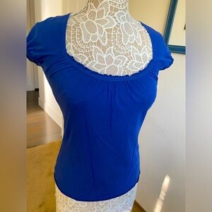 Blue t-shirt. Light-weight, low round neckline. Size S